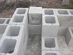 Raising block walls with dry stack cement blocks filled with concrete.