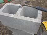 Raising block walls with dry stack cement blocks filled with concrete.