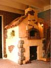 Image of a brick wood burning pizza oven.