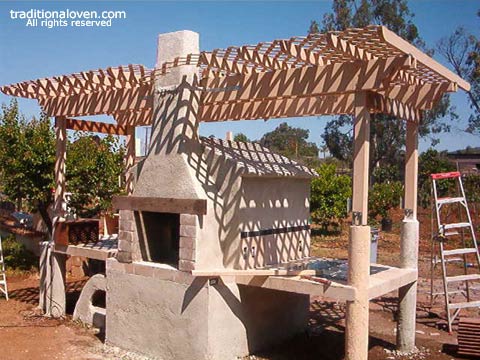 Building progress on wood burning oven by Tony.