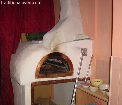 Picture of refractory wood fired oven made in a pizza shop in Martin city, Slovakia.