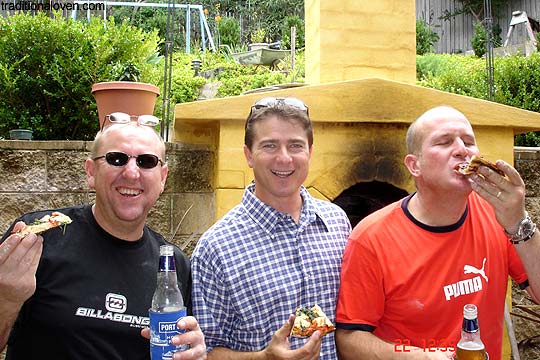 3 Pizza Men friends and oven built in ground.