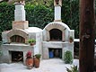Forno wood fired pizza bread oven and fire place.