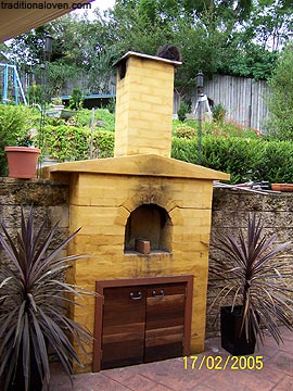 In ground oven built on split level garden backyard.