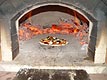 Pizza in wood fired dome.