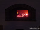 Hot embers in brick ovens dome for pizza evening with family.