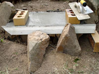 Close up picture of the oven's hearth concrete.