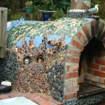 Pizza oven with a beautiful tile mosaic decoration on.