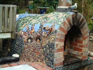 Pizza oven with a beautiful tile mosaic decoration on.