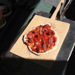 Cooking the very first pizza.