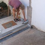 First brick in oven building.