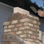 Making chimney capping on a pizza oven.