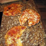 Pizzas cooked in Pompeii oven.