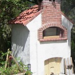 Wood oven with meat cold smoker.