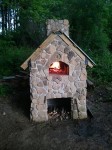 Stone oven inside being heated with fire
