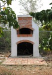 Pizza oven with fruit trees around in Caribbean Anguilla