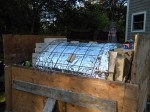 Pouring concrete cladding of pizza oven