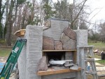 Art tiling with stone on pizza oven