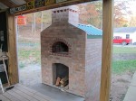 Oven built higher from the ground in wood deck level