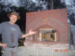 Wood burning oven under roof cover built by Paul