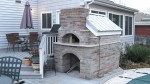 Brick oven on wooden deck