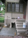 Slab for oven next to cut off space out from stairs.