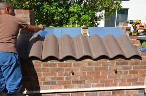 Topping off oven with roof tiles
