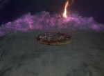 One of the first pizzas on brick hearth.