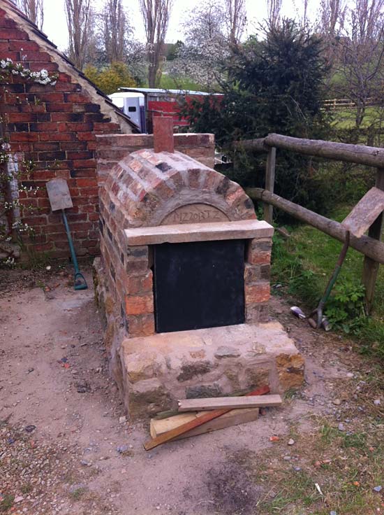 Brick oven with stone base