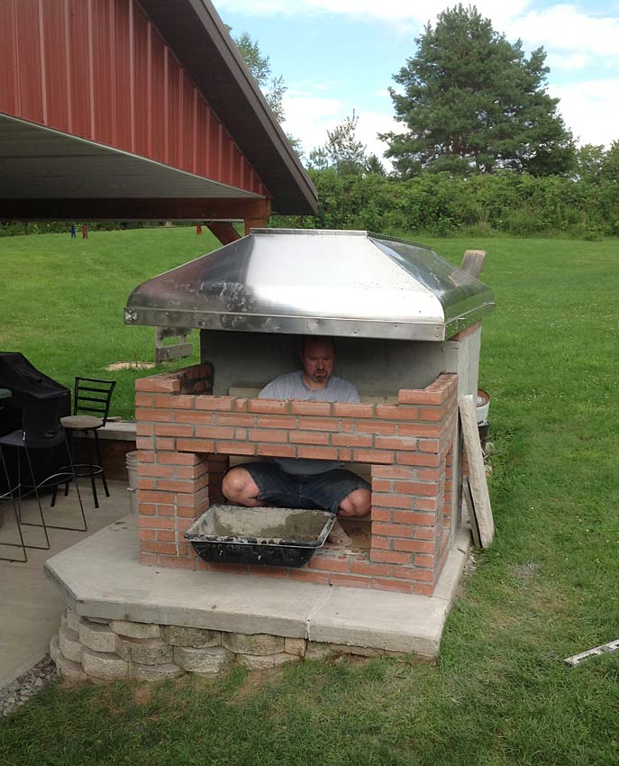 Pizza oven with fireplace and smoker