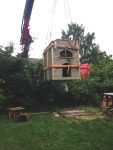 Crane lifts heavy oven
